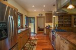Gourmet Galley Kitchen with Granite Counters, Stainless Steel Appliances